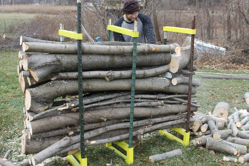 Ready for the second cut through the firewood.